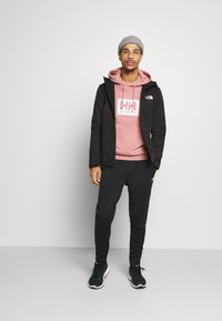 The North Face M QUEST HOODED SOFTSHELL - Softshelljas - tnf black