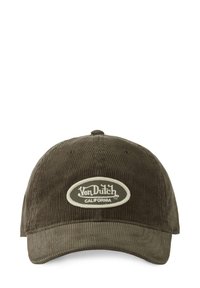 Casquette de baseball en velours côtelé brun avec une visière incurvée, ornée d'un patch logo brodé central en blanc et vert foncé. Surface texturée.