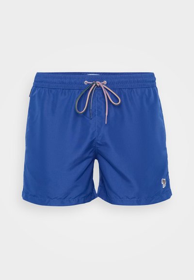 Pantaloni da bagno blu con elastico in vita, cordoncino a contrasto e un piccolo logo sull'orlo. Materiale liscio e leggero.