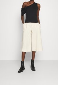 Iro Triko s potiskem - black