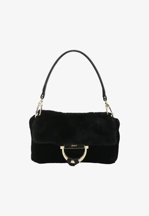 Black faux fur handbag with gold-tone clasp and black leather strap, rectangular shape, and flap closure.