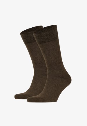 Brown cotton blend socks with a ribbed cuff, mid-calf length, smooth texture, and a seamless toe design. Suitable for casual wear.