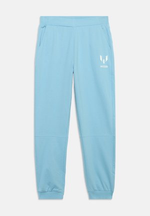 Pantalon de survêtement bleu clair avec poignets élastiques, poches latérales et un logo Messi blanc sur la partie supérieure de la cuisse gauche.