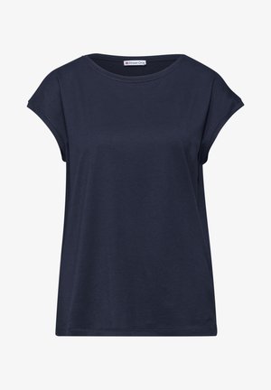 T-shirt femme bleu marine à manches courtes, col rond, manches légèrement roulées et petite étiquette de marque au niveau de l'encolure.