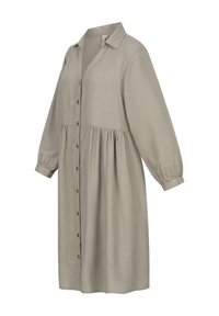 Abito camicia grigio chiaro a maniche lunghe con fronte bottonato, colletto e dettaglio della vita arricciata. Tessuto morbido e texturizzato.