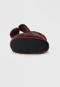 Brown plush slippers with rounded design, featuring soft fur material and a textured black rubber sole for grip. Includes two small ears.