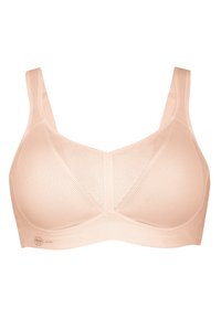 Peach-colored sports bra with mesh fabric, wide straps, soft cups, and a seamless design, featuring subtle brand logo near the bottom.