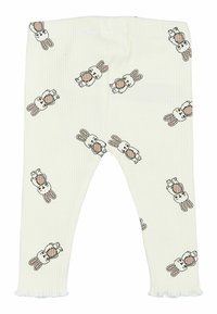 Light cream leggings with a ribbed texture, featuring a repeated bunny print in brown and black outlines and ruffled hems.