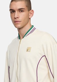 Fila Bomberjacka - antique white f box monogram aop