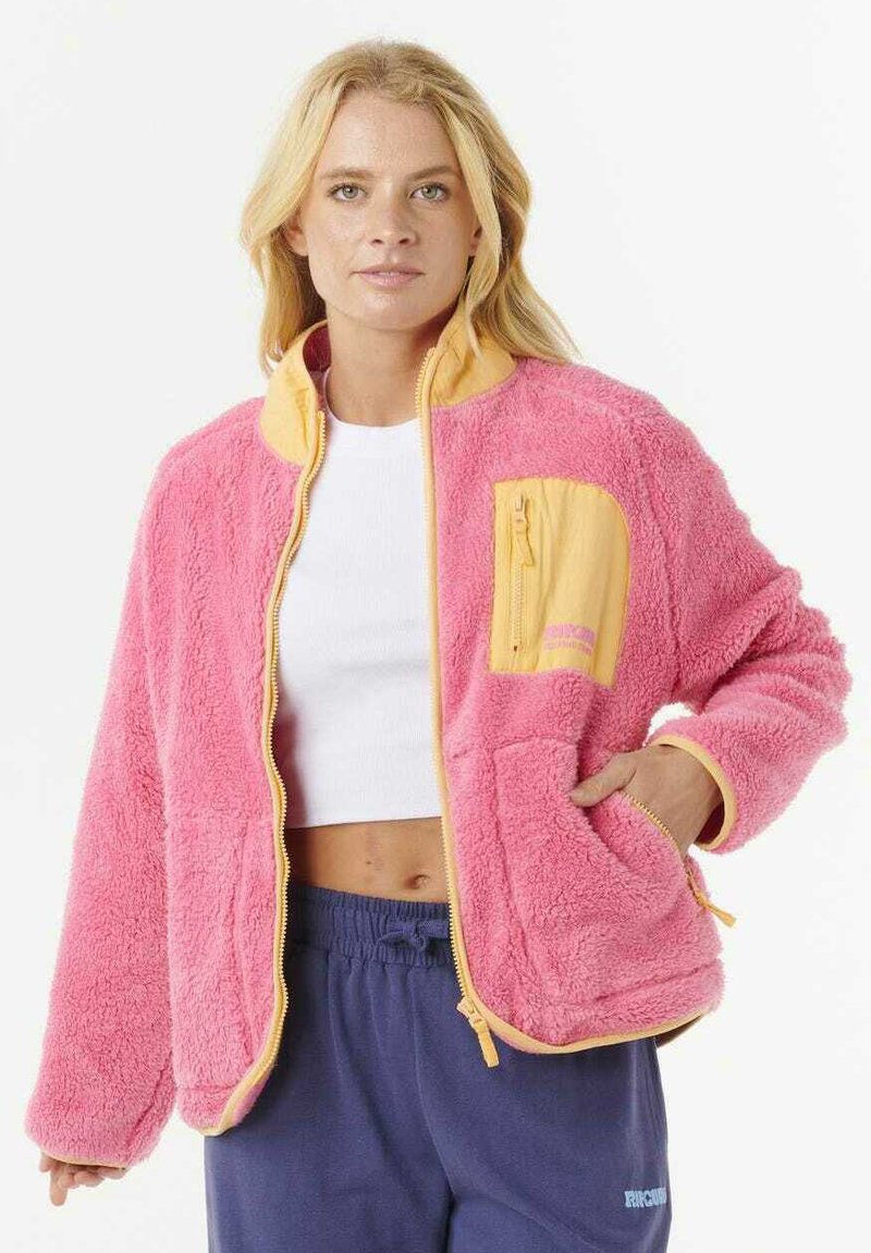 Uldet pink jakke med gule accenter, lynlåslomme på brystet og sidelommer, der har en afslappet pasform og ribbede manchetter.