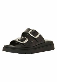 Svart slide sandal med tjock sula, två breda remmar med silverfärgade rektangulära spännen och texturerad läderstruktur.