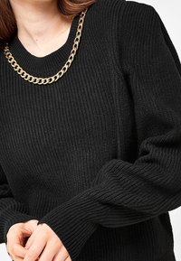Next Sweter