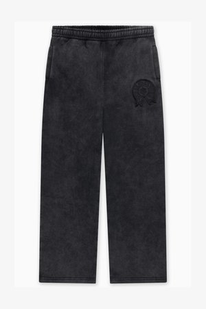 Mustat juoksuhousut pehmeästä, teksturoidusta kankaasta. Niissä on joustava vyötärönauha, kaksi sivutaskua ja kohokuvioitu logoyksityiskohta.