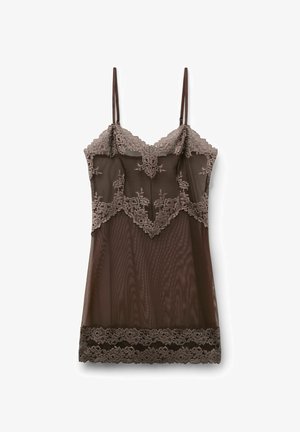 Brązowa przezroczysta halka z koronkową ozdobą w kwiaty przy biuście, dolnej krawędzi i tułowiu, wyposażona w cienkie, regulowane ramiączka na ramionach.