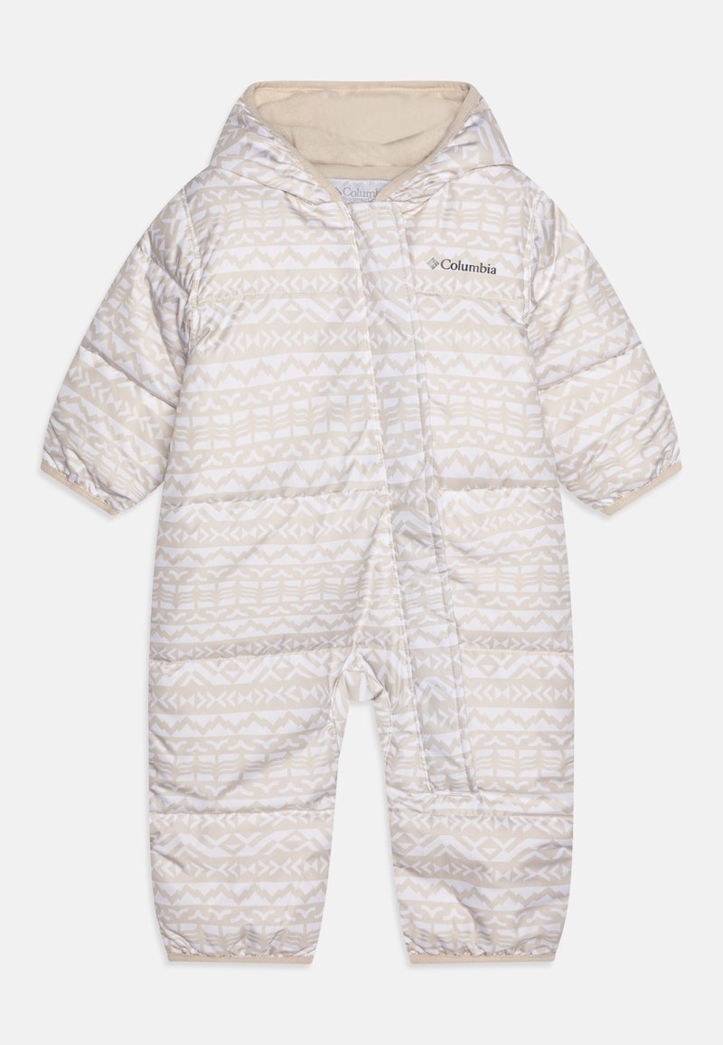Combinaison de neige rembourrée pour enfants en crème avec un motif géométrique blanc, capuche doublée de fourrure, poignets élastiques et fermeture à glissière sur le devant.