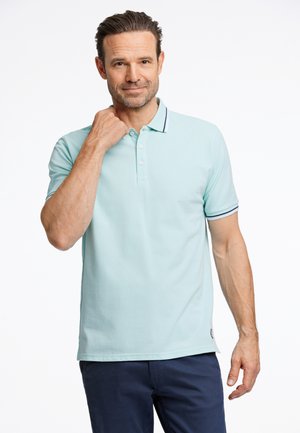 Light blue polo shirt made of soft fabric. Features a classic collar, three-button placket, and navy striped accents on the sleeves.