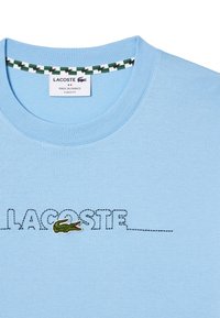 Lacoste BRODÉ FABRIQUÉ EN FRANCE - T-shirt imprimé - bleu