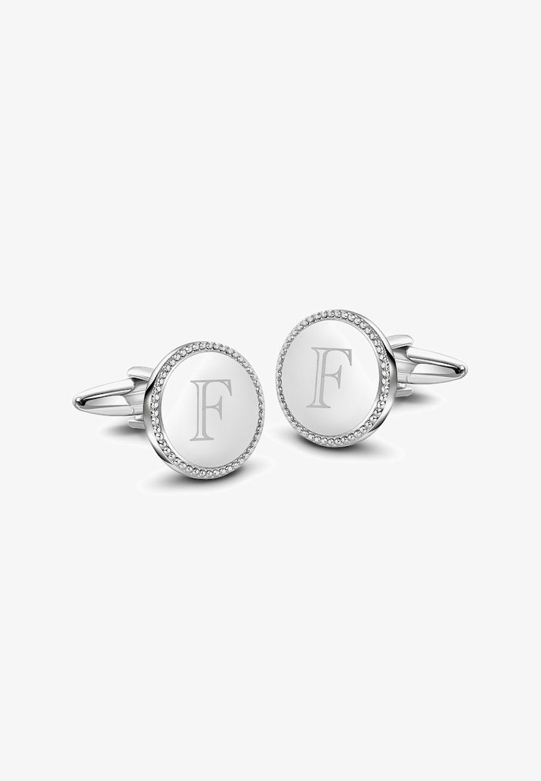 Srebrne spinki do mankietów w okrągłym kształcie, z centralnym grawerem "F" oraz perełkowym brzegiem. Gładka powierzchnia z polerowanym wykończeniem.