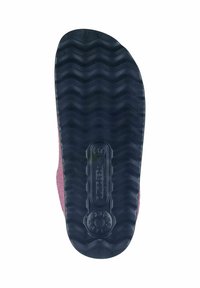 Sole of a shoe, featuring a wavy tread pattern in black rubber, with a textured pink felt upper attached at the edges.