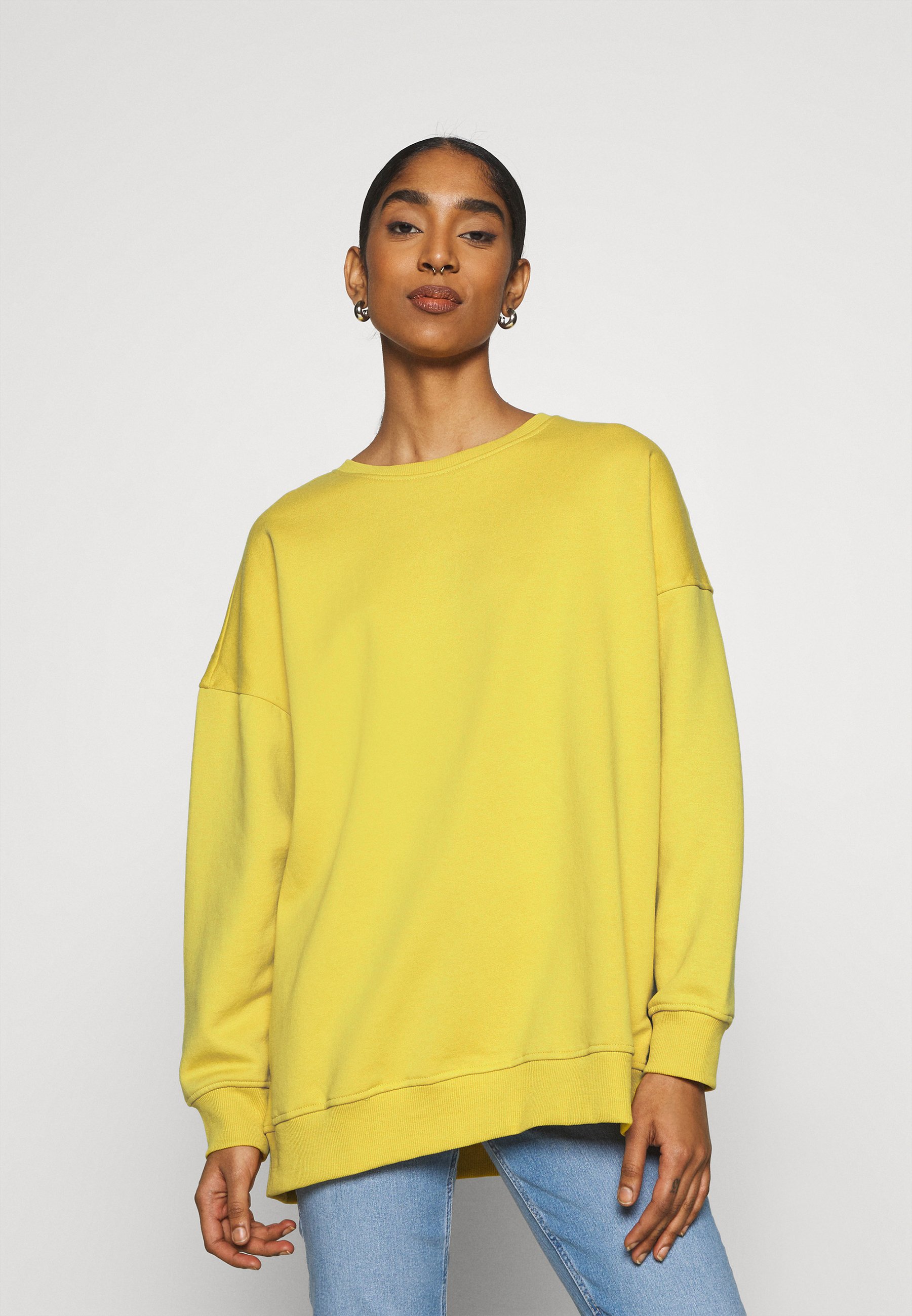 yellow oversized sweatshirt