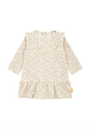 Langärmliges Kleid in Creme mit zarten Blumenmustern, Rüschensaum und gerafftem Saum. Aus weichem Stoff gefertigt, mit seitlichem Knopfverschluss.