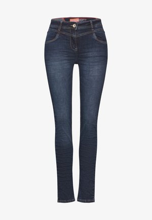 Chude dżinsy w ciemnoniebieskim denimu z pięcioma kieszeniami, z przodem na guzik i subtelnymi kontrastującymi detalami szwów. Gładka struktura na całej powierzchni.