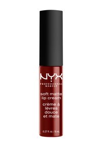 NYX Soft Matte Lip Cream i en cylindrisk röd tub med ett matt svart lock; märkt med produktnamn och volym i vit text.