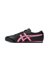 Black athletic shoes with pink accents, featuring a sleek design, smooth leather texture, round toe, and lace-up closure.