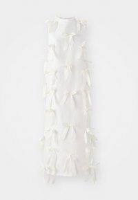 White sleeveless dress featuring numerous tied bows along the front, crafted from a lightweight fabric with a plain texture.