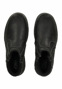 Schwarze Leder-Ankle-Boots mit einer glatten Textur, ausgestattet mit doppelten seitlichen Reißverschlüssen und kontrastierenden weißen Nähten für zusätzliche Details.