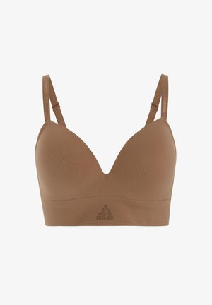 Brassière de sport marron rembourrée avec bretelles réglables, comportant le logo Adidas et du texte sur les bretelles et la bande centrale.