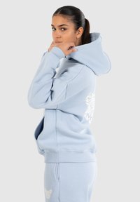 Smilodox NALA BACK PRINT HOODIE - Felpa con cappuccio - hellblau