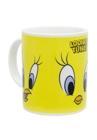 Tazza in ceramica con superficie gialla lucida, caratterizzata da volti di personaggi dei cartoni animati, grandi occhi espressivi e il logo "Looney Tunes" in nero.