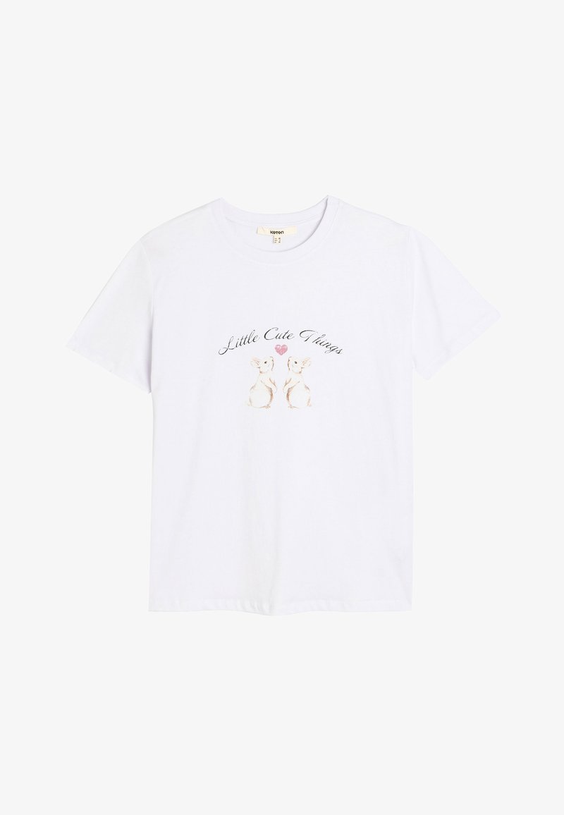 White cotton t-shirt with short sleeves and a round neckline, featuring a printed design of two rabbits and the text "Little Cute Things."