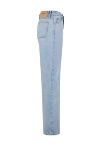 Lys blå rette jeans med midjehøyde, med fem lommer og subtile sømmer på baklommen. Skinnetikett på livlinen.