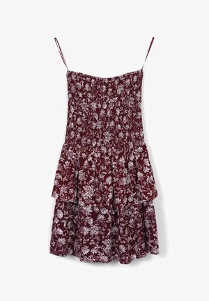 Bezramienna bordowa sukienka w biały kwiatowy wzór, z marszczonym gorsetem, cienkimi ramiączkami i warstwami spódnicy w kształcie tierów.