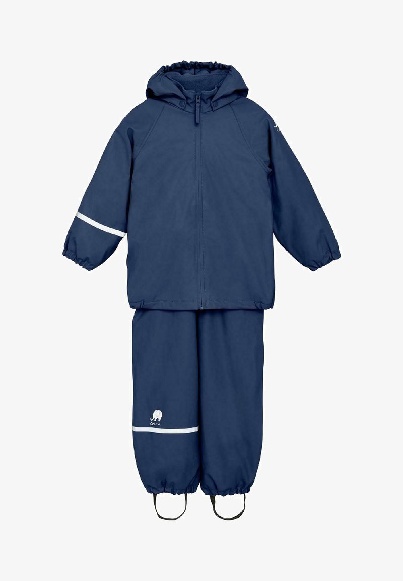 Veste imperméable pour enfant bleu marine avec capuche et pantalon assorti, poignets élastiques, bandes réfléchissantes et sangles aux pieds pour un maintien sécurisé.