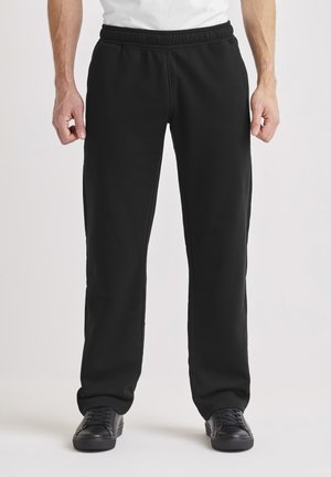 COMFORTABLE WITH BACK POCKETS - Träningsbyxor - black