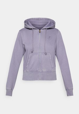 Lilla Zip-up hettegenser med snøring i hetten, frontlommer og ribbestrikkede mansjetter. Har et sydd logo på brystet. Mykt materiale med en avslappet passform.