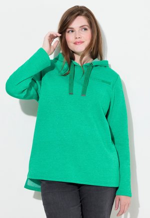 Felpa verde con cappuccio e superficie testurizzata, dotata di lacci e tasca frontale. Stile rilassato con un retro più lungo.