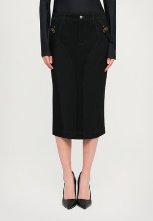 Black denim pencil skirt with contrast stitching, featuring side pockets with hardware accents and a sleek, fitted silhouette.