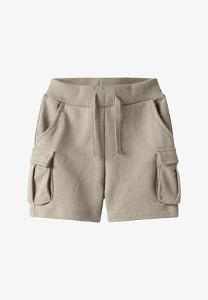 Shorts en mélange de coton beige avec une taille élastique, un cordon de serrage, deux poches latérales et deux poches cargo sur les cuisses. Texture douce.