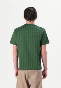Lacoste Tricou cu imprimeu - green/sinople