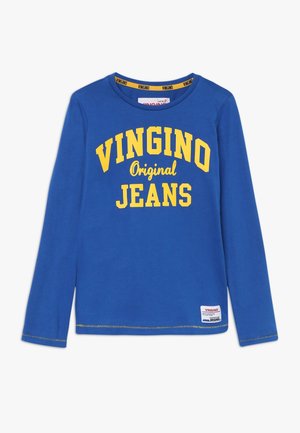 Niebieska koszula z długim rękawem z żółtym napisem "VINGINO Original JEANS" na wysokości klatki piersiowej oraz małą markową naszywką przy dolnym brzegu.