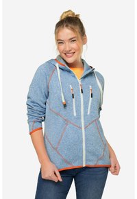 Blå zip-up hoodie tillverkad av texturerad tyg, med vita dragsnören, orange detaljer och diagonala sömmar.