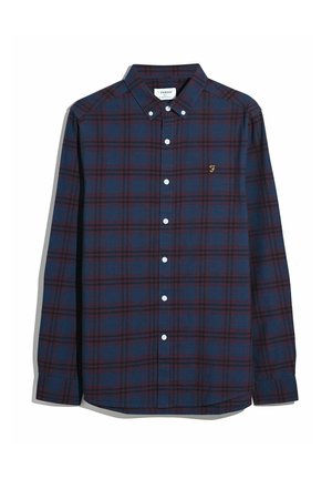 Navy and burgundy plaid long-sleeve shirt with a button-down collar, white buttons, and a small gold logo on the chest.