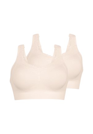 Due reggiseni wireless beige con spalline larghe in pizzo e coppe senza cuciture, mostrati su sfondo bianco.