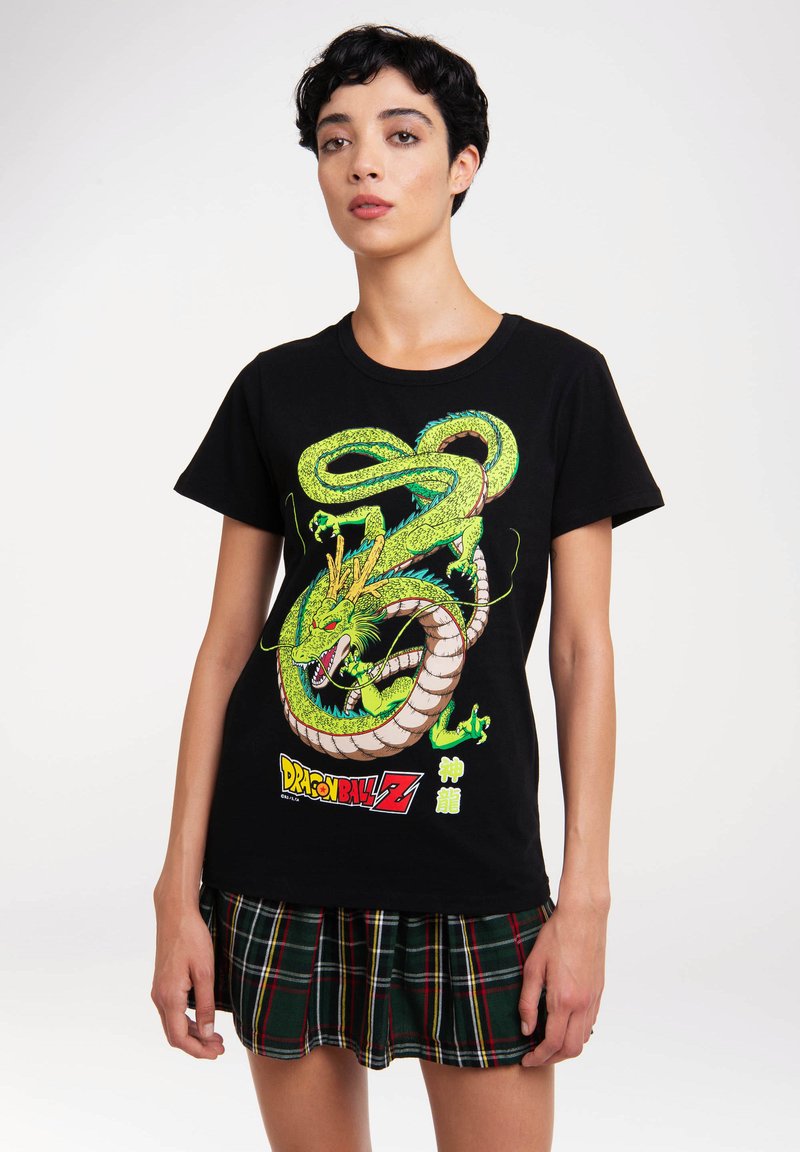 Black cotton t-shirt featuring a vibrant green dragon graphic with a yellow crown and "Dragon Ball Z" text in red and blue.