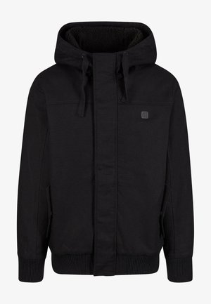 Fekete kapucnis dzseki cipzárral az elején, plüss belső bélés, oldalsó zsebek, bordás mandzsetták és egy kis logós patcsh a mellkason.