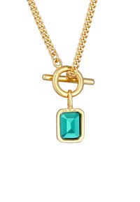 Collier chaîne en ton doré avec un pendentif rectangulaire en turquoise. Le pendentif présente une surface facettée et est monté dans un cadre en or.